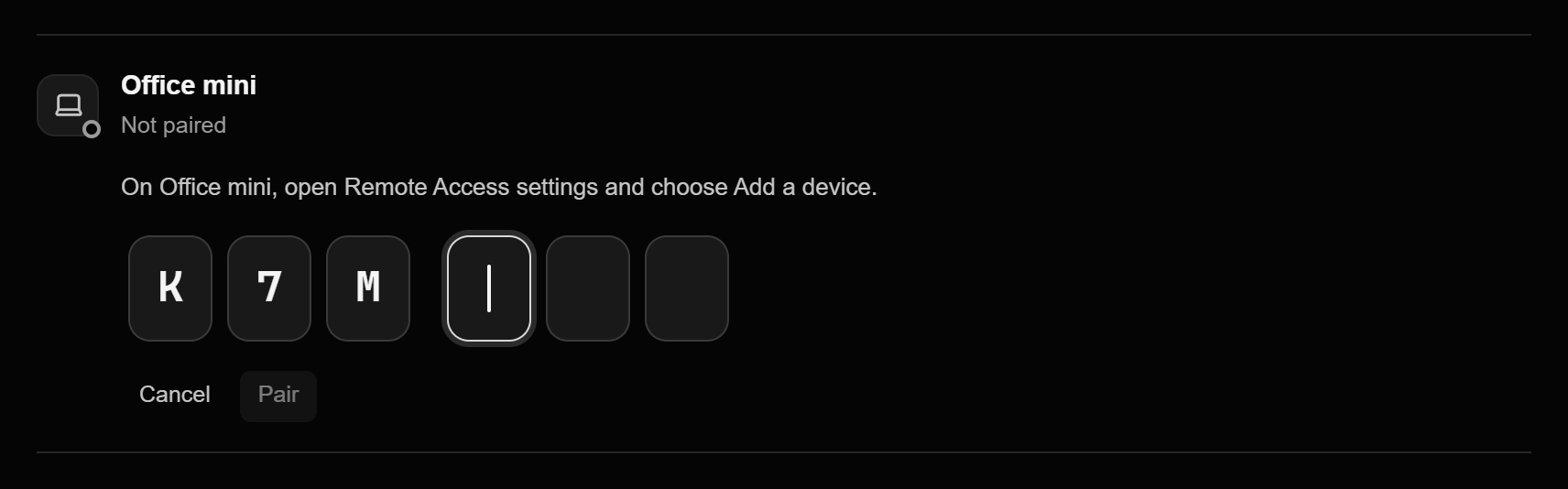 Another computer typing the pairing code